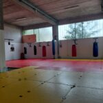 La palestra di Grappling Senigallia con tatami e sacchi